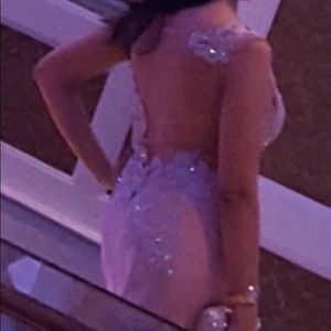 Jovani  sheer illusion gown , front slit. Backless , built in bra . Beaded